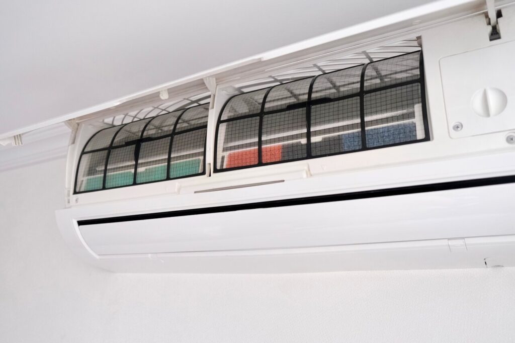 Modern ductless air conditioner on the wall, ensuring a cool atmosphere indoors.